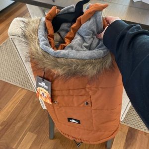 Dog Whisperer brand burnt orange dog jacket